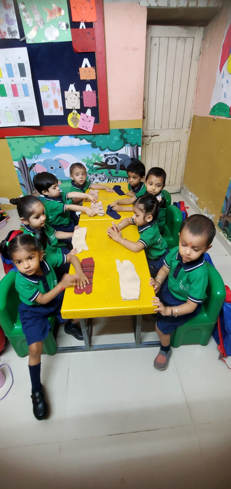 Children engaged in play-based learning at Enfance